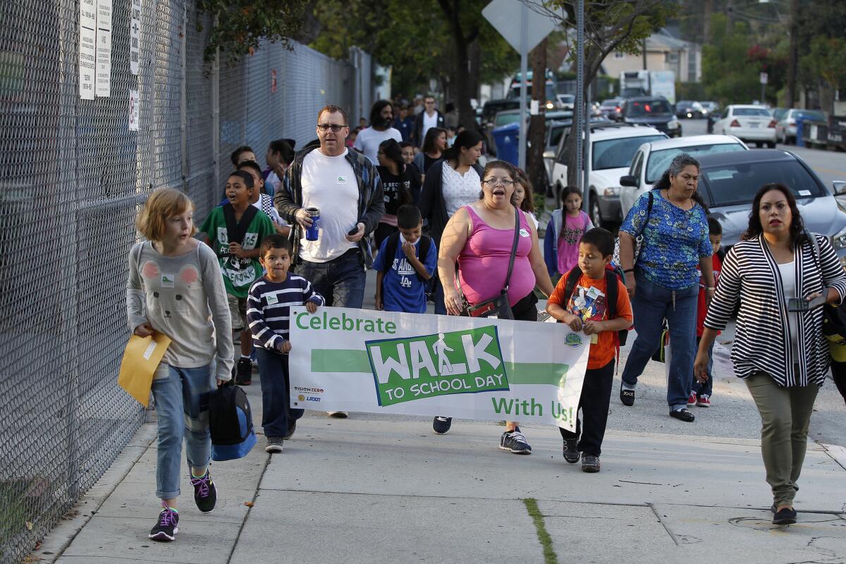 Elysian Heights Elementary students and their families join in L.A. Unified's Walk to School Day in Echo Park. In Los Angeles County, nearly a third of students walk to school.