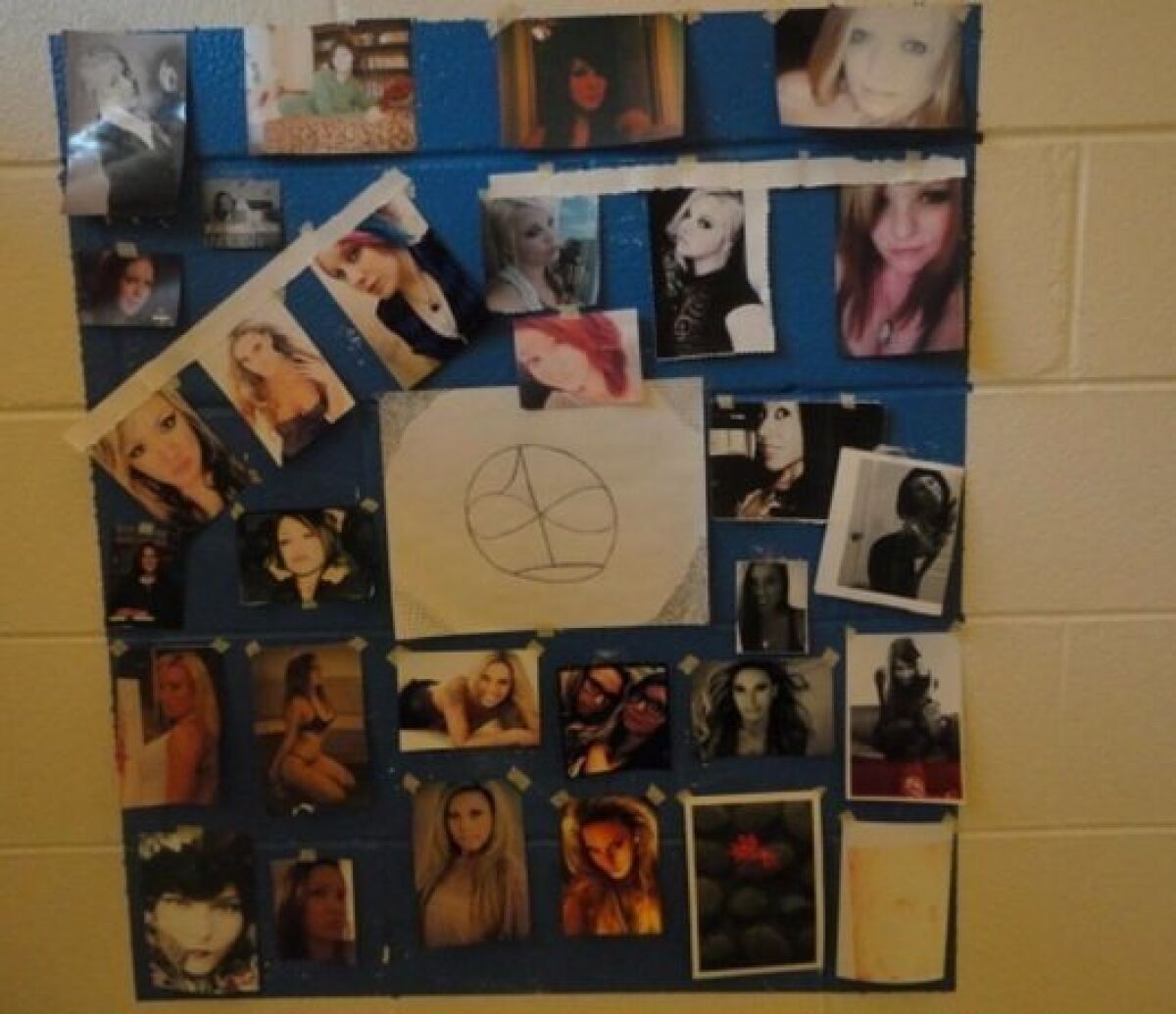 James Holmes posted photos from his fans on the wall of his jail cell.
