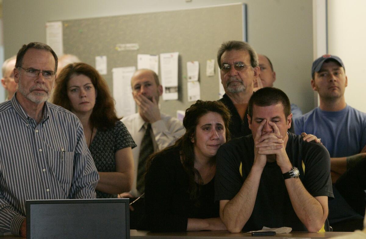 Rocky Mountain News employees as they learned in 2009 that the newspaper would close.