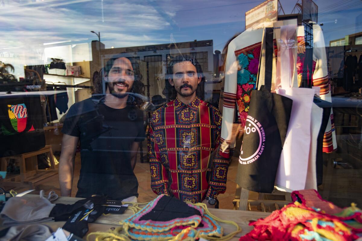 Life-long best friends and business partners Francisco Alvarez, left, and Oscar Yapor.