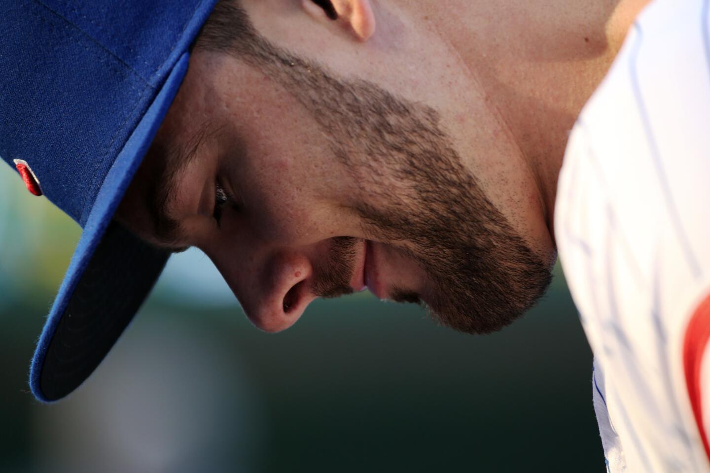 Kris Bryant signs autographs before a game against the Diamondbacks at Wrigley Field on Aug. 1, 2017.
