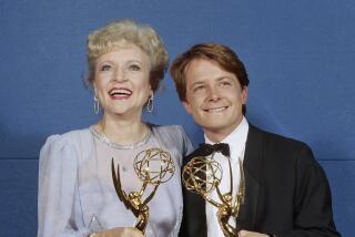 Michael J. Fox and Betty White, winners of Emmys for best actor and actress in a comedy series, Sept. 21, 1986