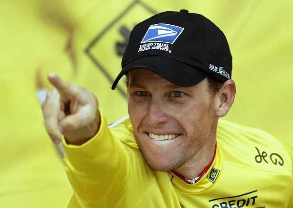 Lance Armstrong celebrates after winning a stage of the Tour de France in 2003. Robert Feldman, a leading researcher on the psychology of lying, says that in the case of Armstrong's deception, "he was pretty confident he could get away with it."