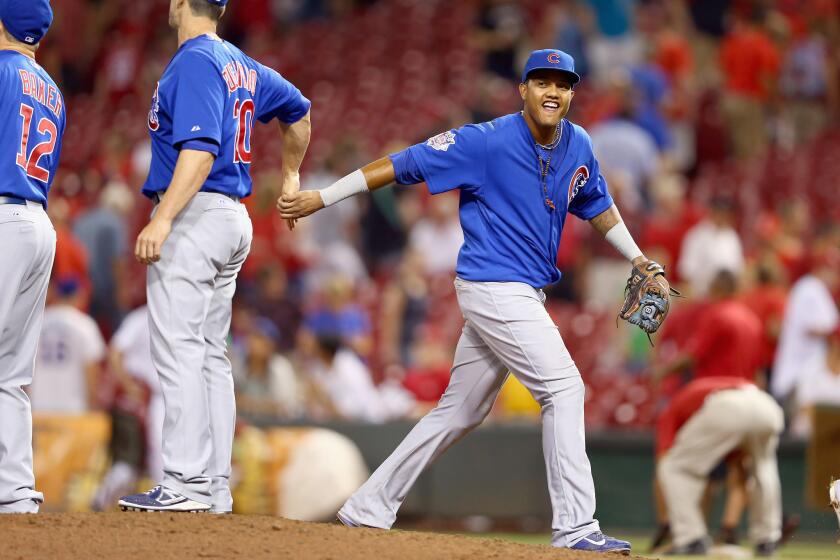 Starlin Castro celebrates after the 3-0 win over the Reds.