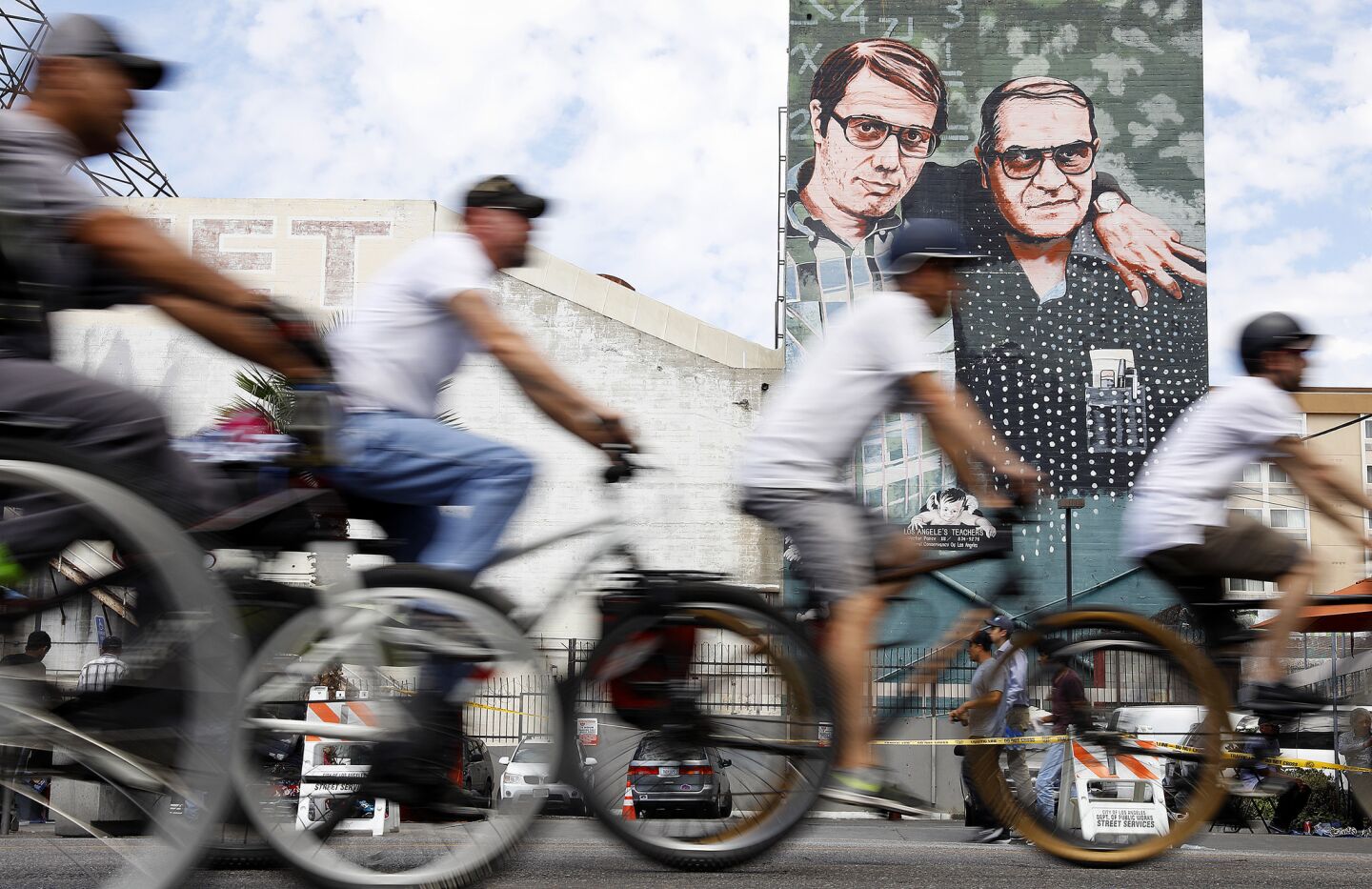 Bicyclists ride along Wilshire Boulevard past the MacArthur Park Hub during CicLAvia: Celebrate LA!.