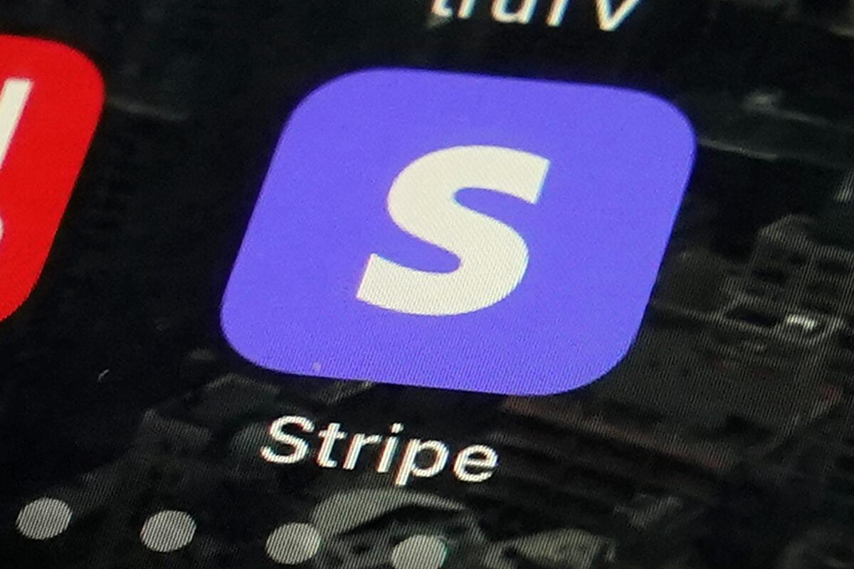 This photo shows the Stripe app, on an iPhone screen, in New York, Monday, March 15, 2021. The online payment company continues to attract investors, raising $600 million in funding to reach a company valuation of $95 billion, making it the most valuable private fintech company in the world. (AP Photo/Richard Drew)