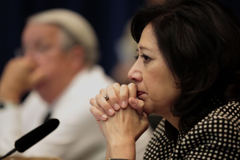 Los Angeles County Supervisor Hilda L. Solis (First District) listens to public testimony on May 12.