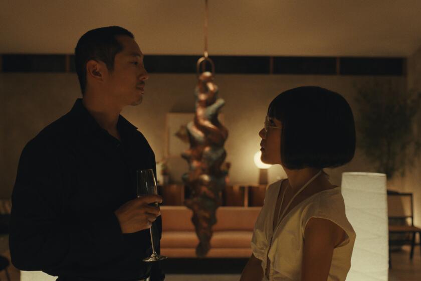 Steven Yeun and Ali Wong in a scene from "Beef."