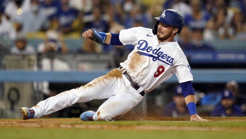 Los Angeles Dodgers' Gavin Lux scores against the Arizona Diamondbacks.