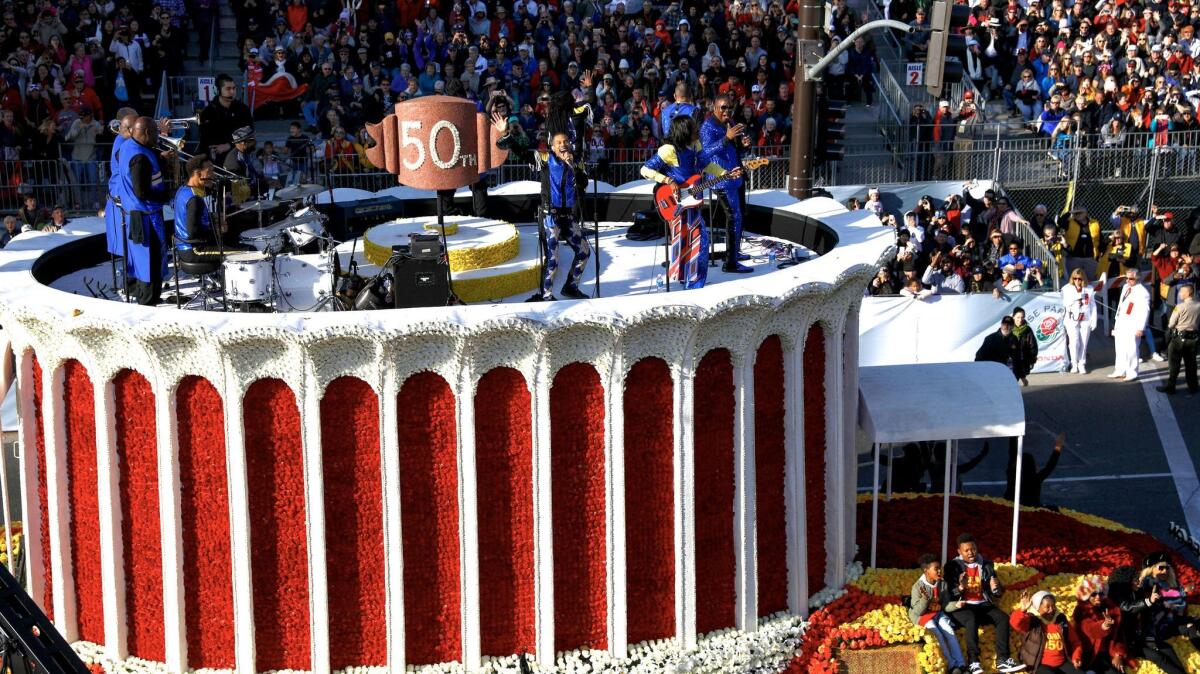 Earth, Wind & Fire performs atop a Rose Parade float depicting the Forum in Inglewood.