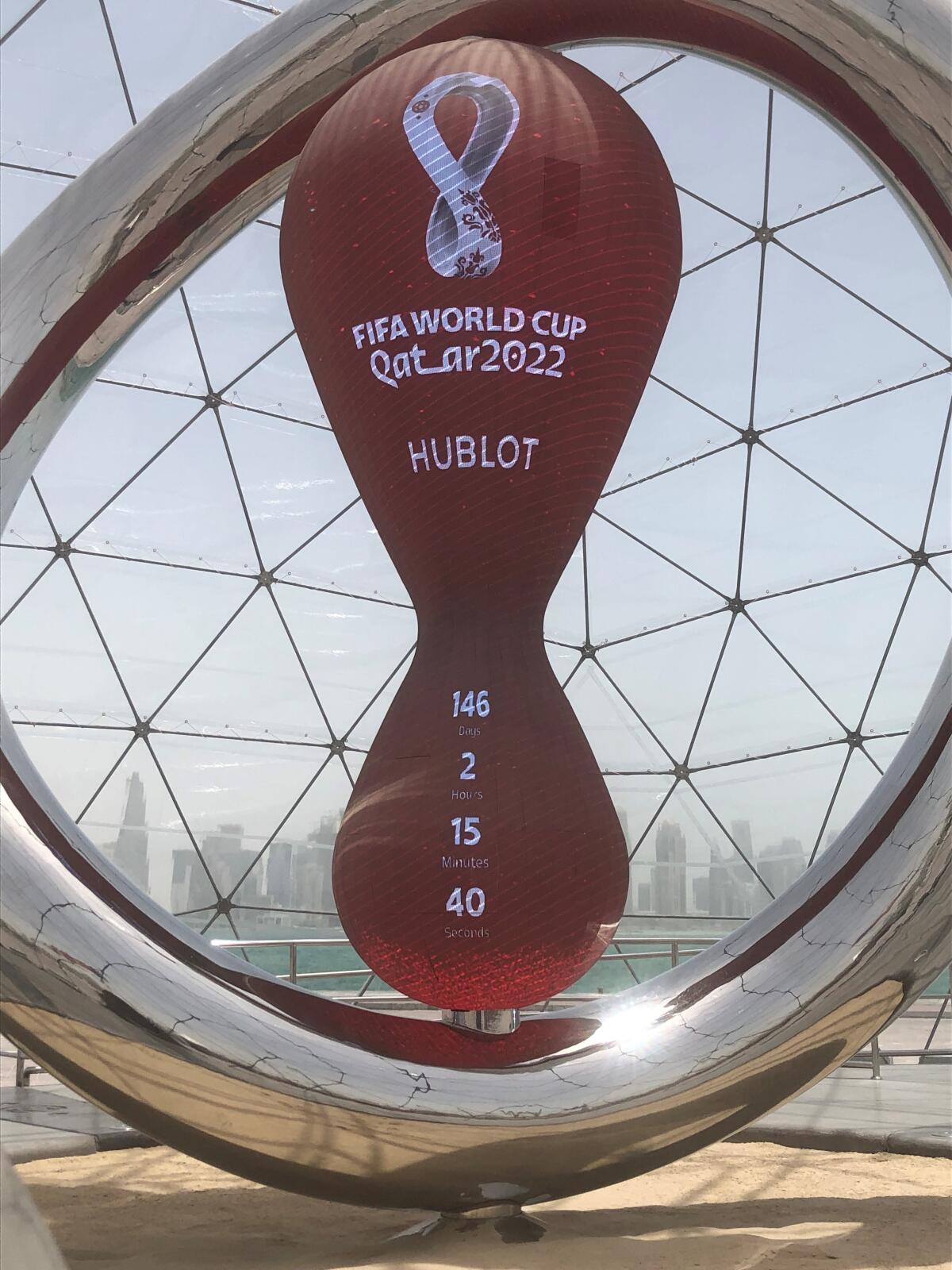 A clock in Doha, Qatar, counts down the days until it hosts the next FIFA World Cup.