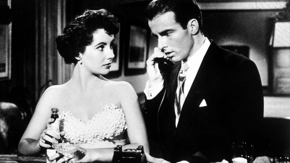 Elizabeth Taylor and Montgomery Clift in "A Place in the Sun." (File photo)