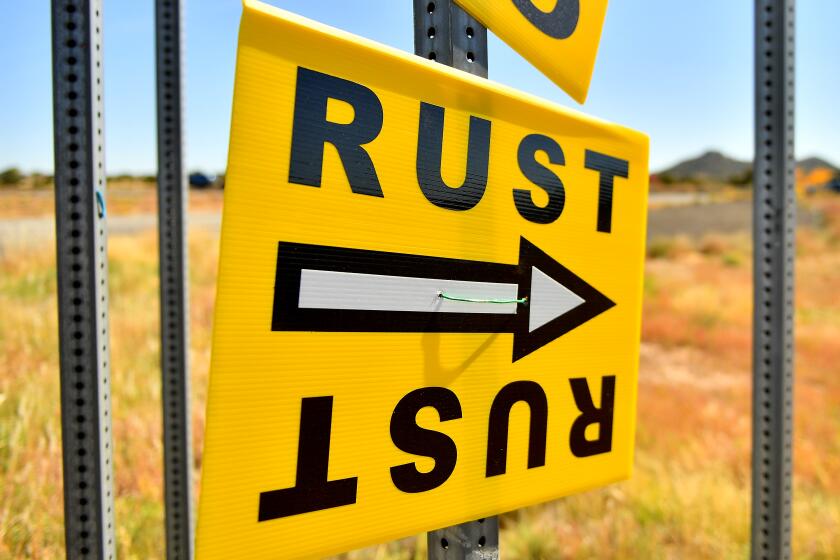 A sign directs people to the road that leads to the Bonanza Creek Ranch where "Rust" was being filmed near Santa Fe.