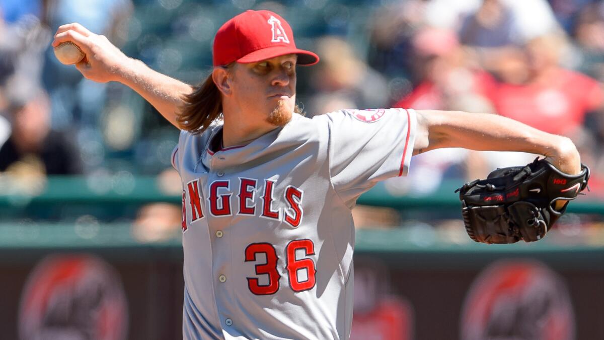 Angels starter Jered Weaver delivers a pitch during the first inning of a 12-3 victory over the Cleveland Indians on Monday.