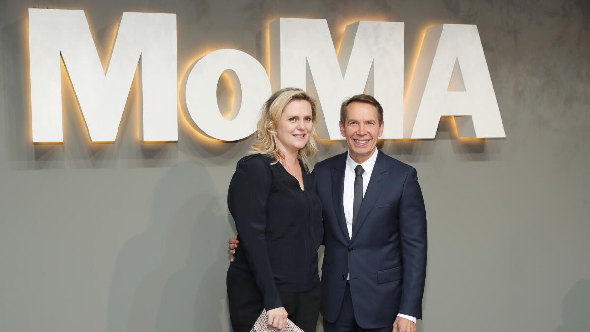 Jeff Koons, right, with his wife Justine Wheeler, at an event at the Museum of Modern Art in June.