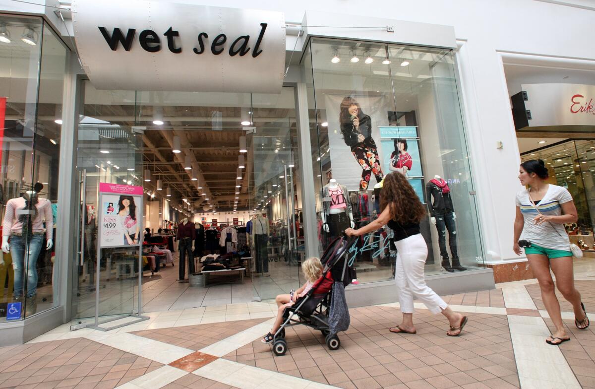 Shoppers walk past a Wet Seal store at Fashion Square Mall in Sherman Oaks in September 2012.