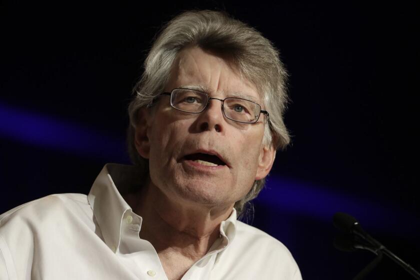 In this June 1, 2017, photo, author Stephen King speaks at Book Expo America in New York. King discussed in an interview with The Associated Press how he views Hollywood adaptations of his writings, including the upcoming film "It," and how even as the leading creator of horror fiction, he still has the ability to write things that scare him. (AP Photo/Mark Lennihan)