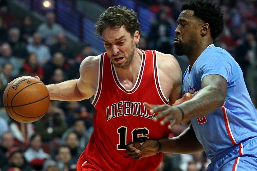 Clippers center DeAndre Jordan defends against a drive by Bulls forward Pau Gasol in the first half.