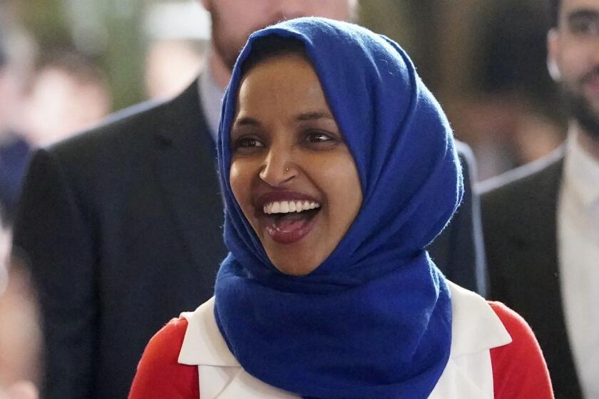 In this Feb. 5, 2019 photo, Rep. Ilhan Omar, D-Minn., arrives for President Donald Trump's State of the Union address to a joint session of Congress on Capitol Hill in Washington. (AP Photo/Carolyn Kaster)