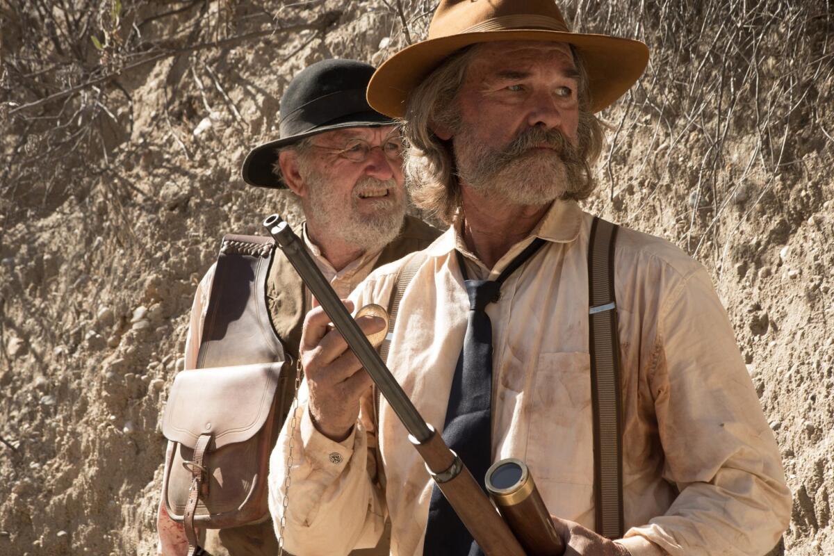 Richard Jenkins, left, as Chicory and Kurt Russell as Sheriff Franklin Hunt in the western film "Bone Tomahawk."