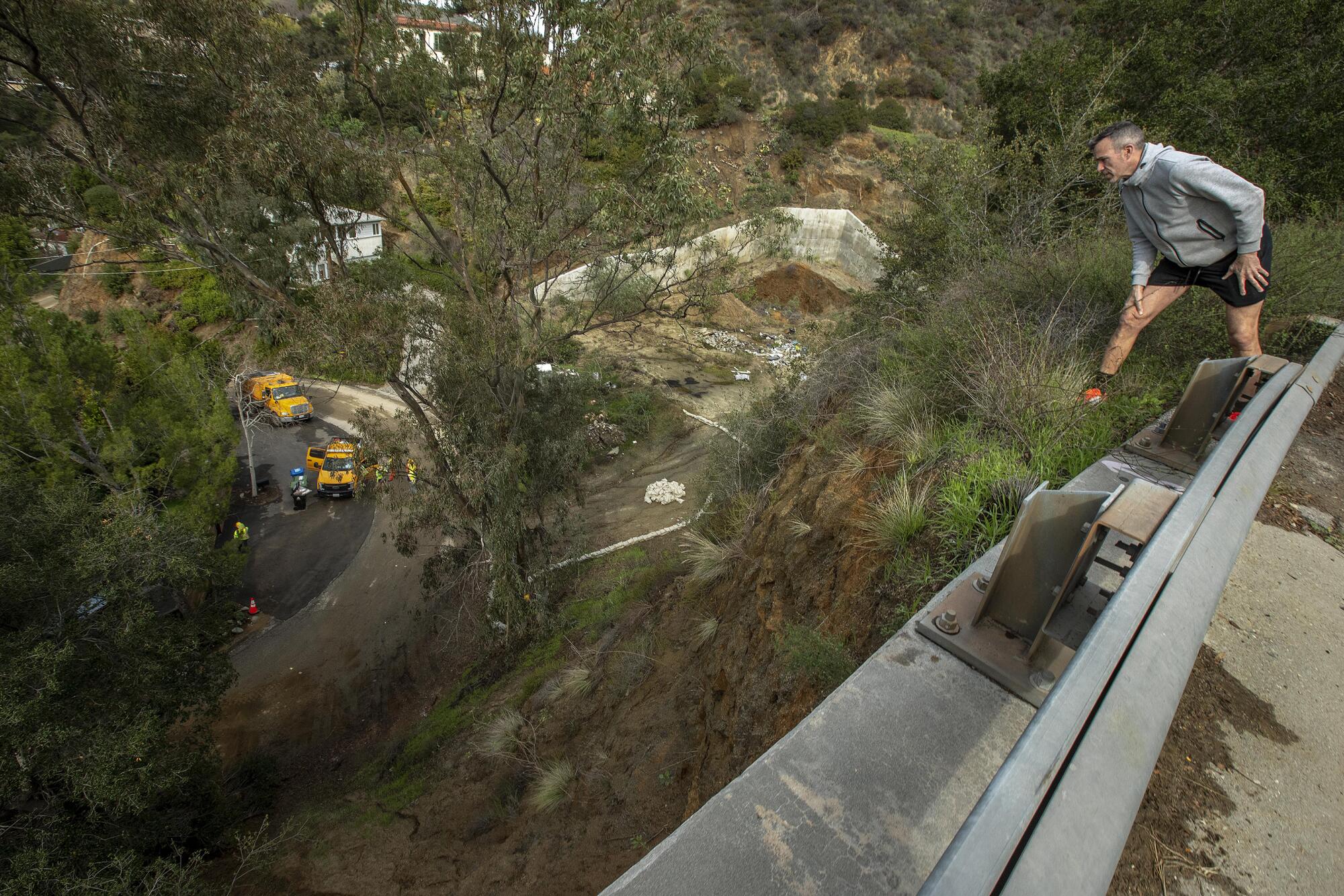 Cyd Zeigler gets an elevated view of a mudslide on Nichols Canyon Road in Los Angeles 