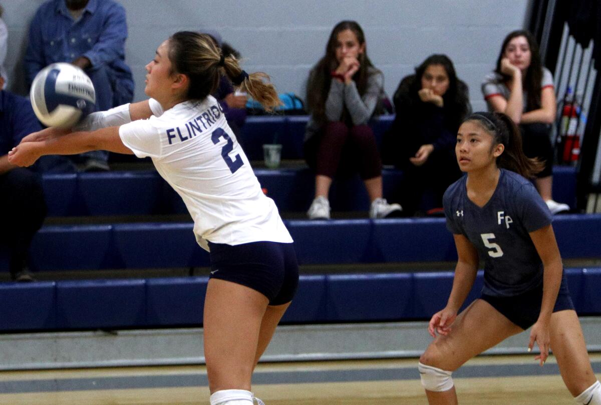 Flintridge Prep girls' volleyball player #2 Ellen Chang receives the ball in game vs. Chadwick, at home in La Canada Flintridge on Tuesday, Oct. 1, 2019.