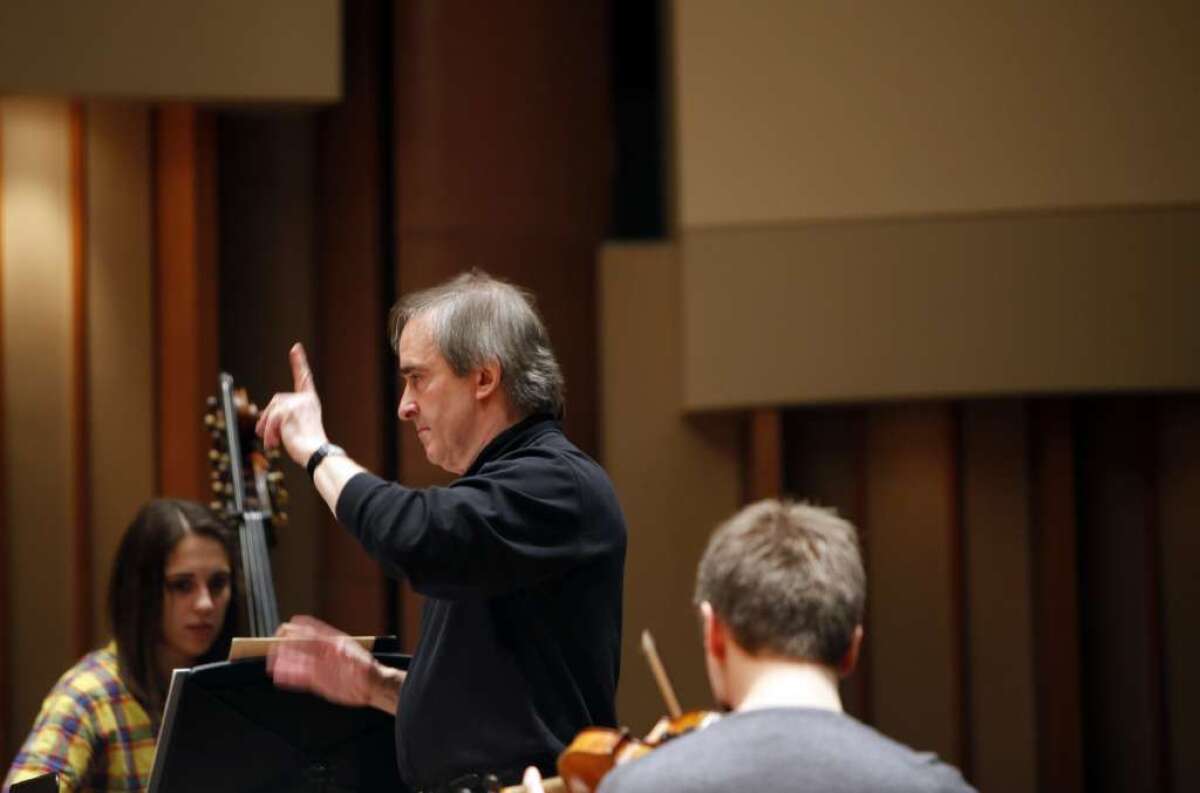 Conductor James Conlon, music director of Los Angeles Opera, leading students at the Colburn School in 2012.