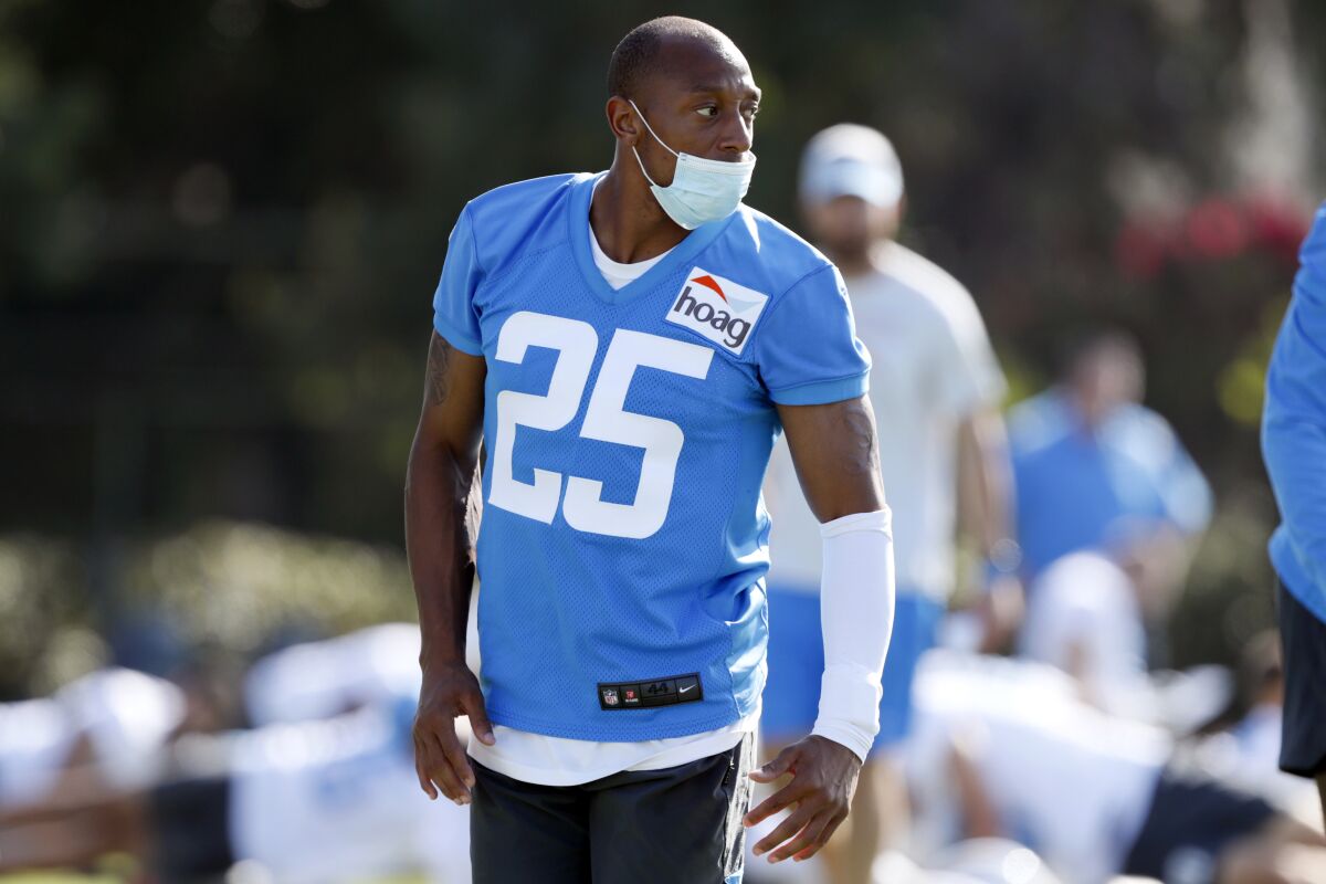 Chargers cornerback Chris Harris looks over during practice at training camp.