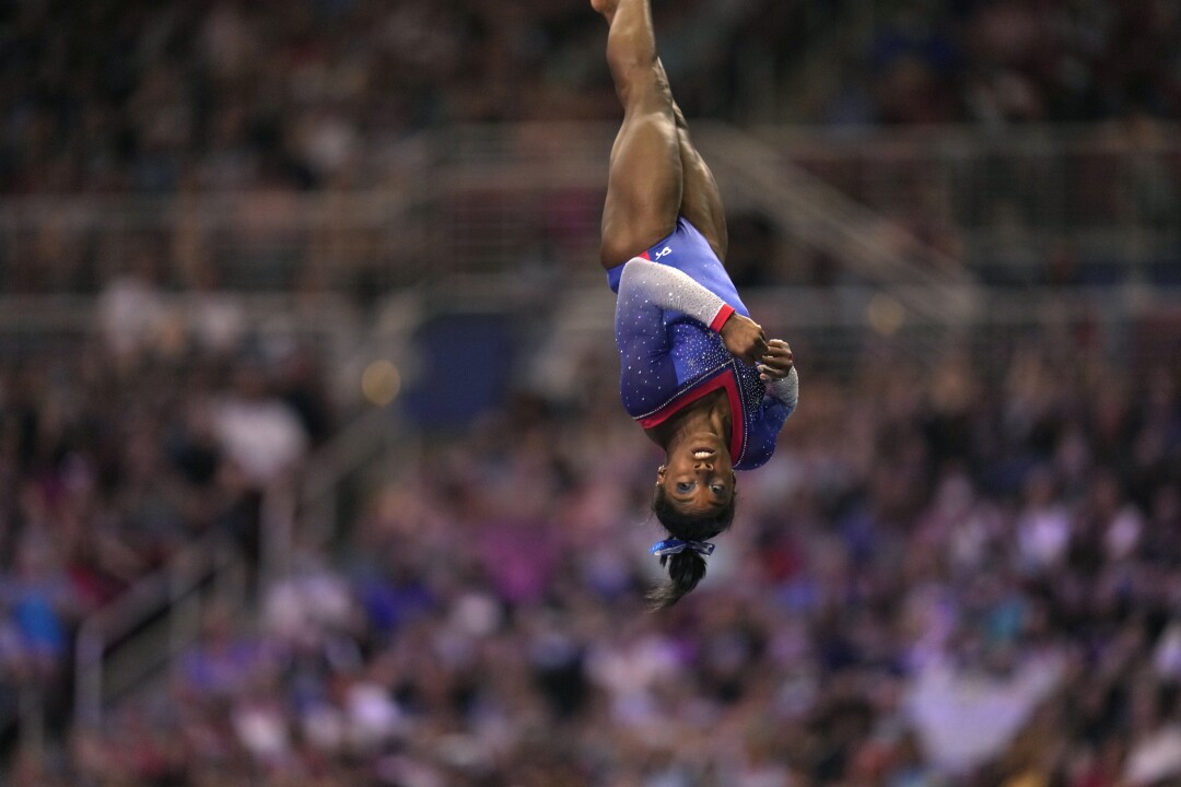 Simone Biles competes on the vault