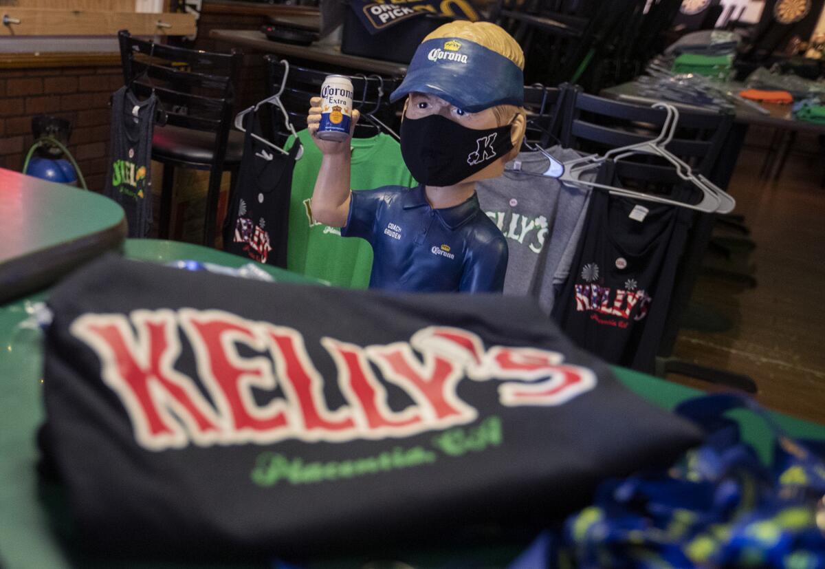 T-shirts and other items on sale at Kelly's Korner Tavern.