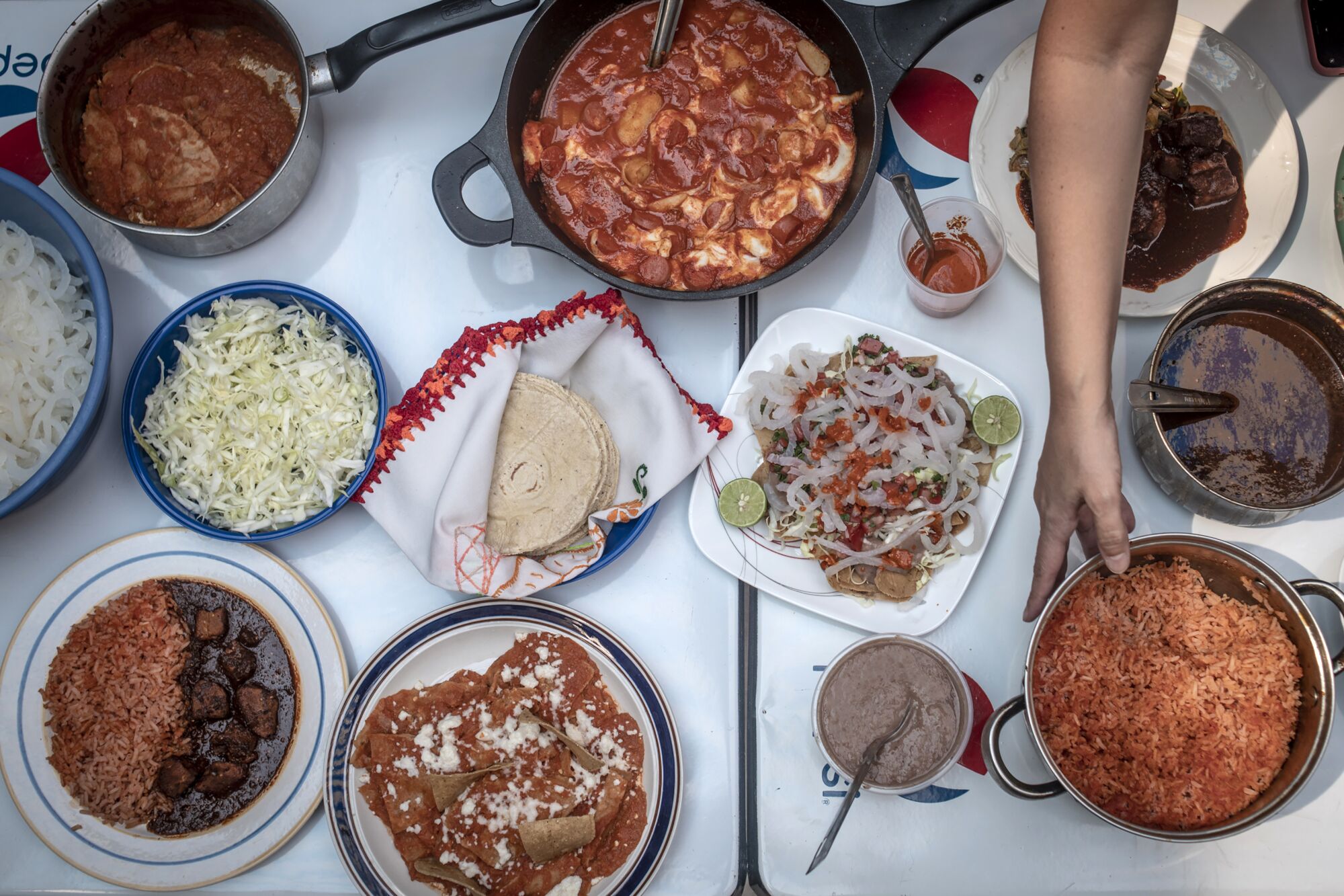 A table set with a variety of Mexican dishes