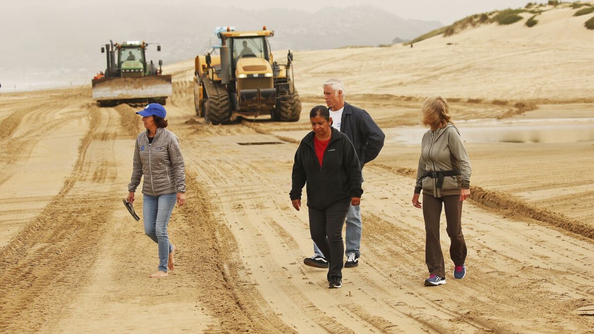 Cynthia Replogle, left, president of the Oceano Beach Community Assn., which supports restrictions on off-roading at the park.