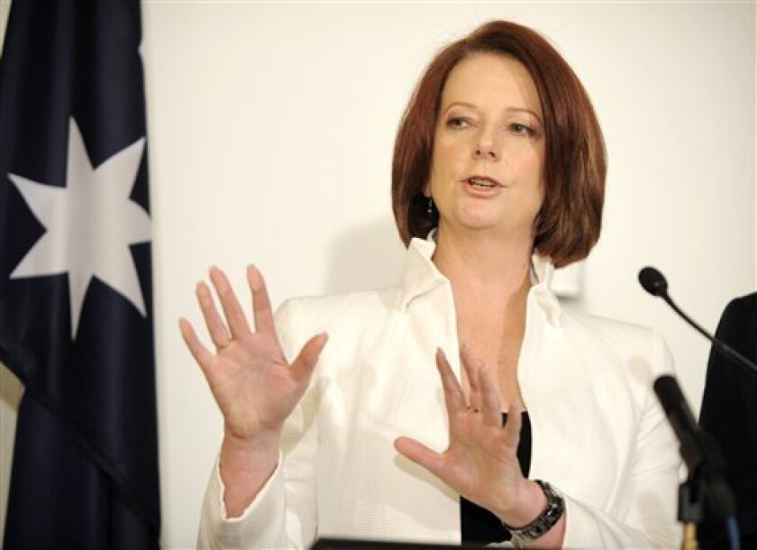 Australian Prime Minister Julia Gillard speaks during a press conference in Canberra, Australia, Tuesday, Sept. 7, 2010. Gillard will lead Australia's first minority government in 67 years after two independent lawmakers threw their support behind her center-left Labor Party, ending two weeks of uncertainty left by national elections that ended on a knife-edge. (AP Photo/Mark Graham)