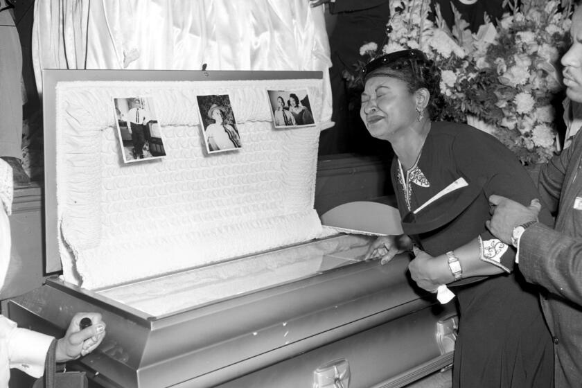 Mamie Till Mobley weeps at her son's funeral on Sept. 6, 1955, in Chicago.