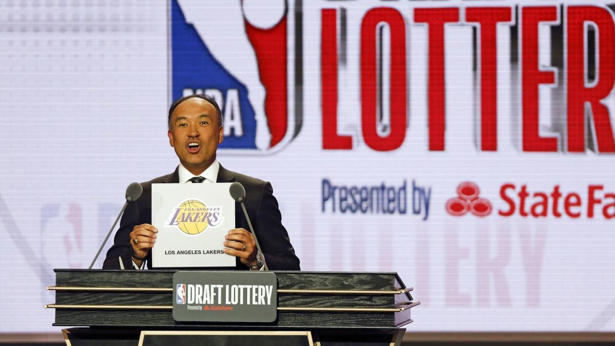 NBA deputy commissioner Mark Tatum announced the Lakers had won the fourth pick during the NBA draft lottery on Tuesday in Chicago.