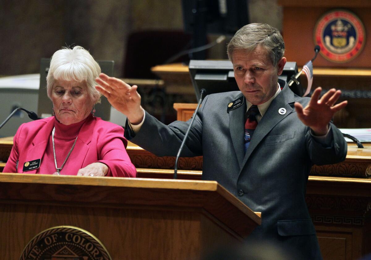 Colorado state Sen. Kevin Lundberg (R-Berthoud) argued that the bill passed Friday would put an undue burden on friends and neighbors. At left is state Sen. Lois Tochtrop (D-Thornton).