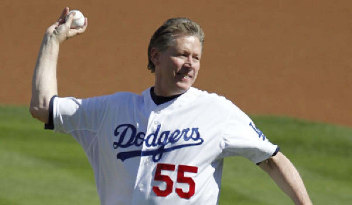 Former Dodgers pitcher Orel Hershiser throws out the first pitch during Game 5 of the NLCS match last October.