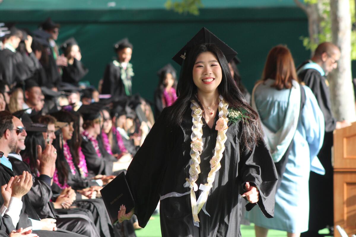 Anna Lin of Irvine smiles after receiving her diploma.
