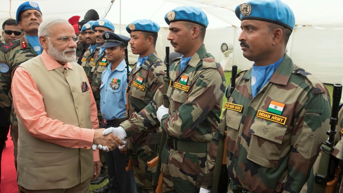 Indian Prime Minister Narendra Modi greets Indian soldiers deployed with the U.N. peacekeeping force in Lebanon on July 6, 2017.