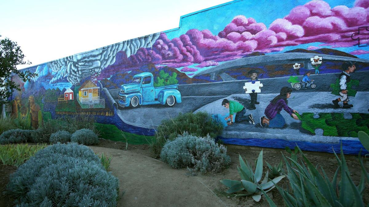 A mural in the Fox and Laurel Park in Pacoima, which is part of the 7th Council District. A runoff election this month will decide who will fill the seat vacated last year by Councilman Felipe Fuentes. (Mel Melcon / Los Angeles Times)