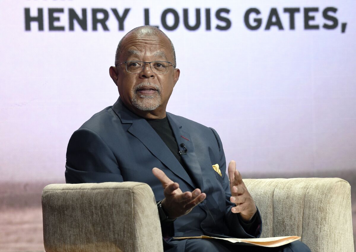 FILE - Dr. Henry Louis Gates Jr., host and executive producer of the PBS series "Finding Your Roots," takes part in a panel discussion during the 2019 Television Critics Association Summer Press Tour in Beverly Hills, Calif., on July 29, 2019. Gates Jr., details the social history of African Americans in a four-part PBS series, “Making Black America: Through the Grapevine.” (Photo by Chris Pizzello/Invision/AP, File)