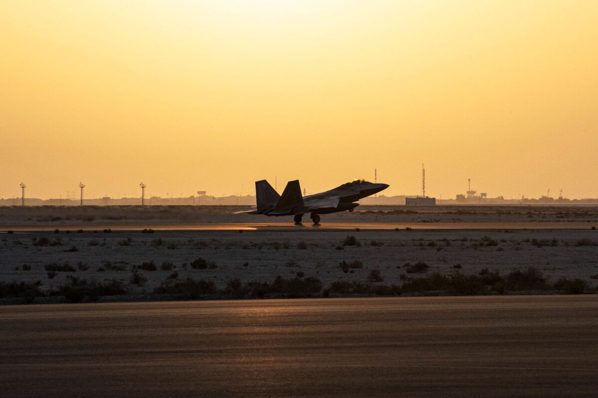 In this photo released by the U.S. Air Force, a U.S. Air Force F-22 Raptor arrives at Al-Dhafra Air Base in Abu Dhabi, United Arab Emirates, Saturday, Feb. 12, 2022. U.S. F-22 fighter jets arrived in the United Arab Emirates on Saturday, part of an American defense response to recent missile attacks by Yemen's Houthi rebels targeting the country. (Tech Sgt. Chelsea E. FitzPatrick/U.S. Air Force via AP)