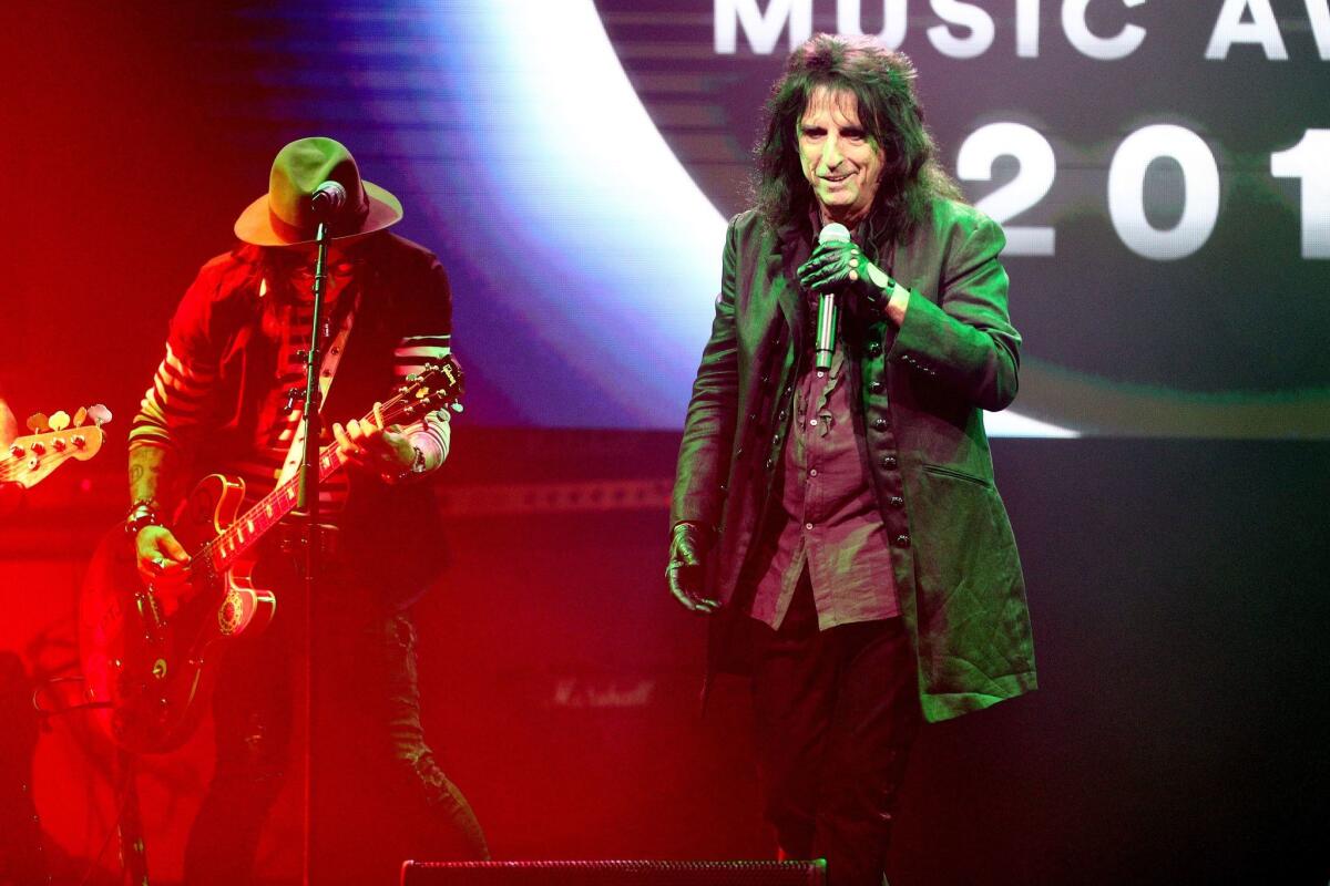 Alice Cooper, right, onstage at the 35th annual ASCAP Pop Music Awards.