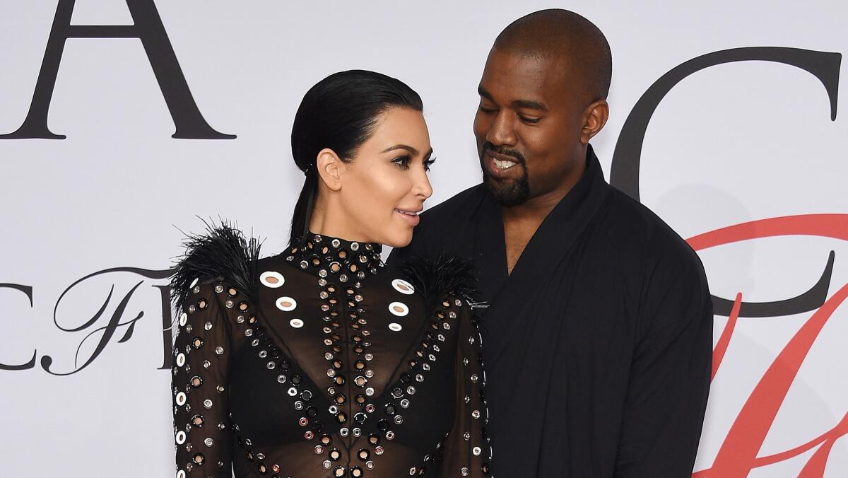 Kim Kardashian and Kanye West attend the CFDA Fashion Awards in New York on June 1.