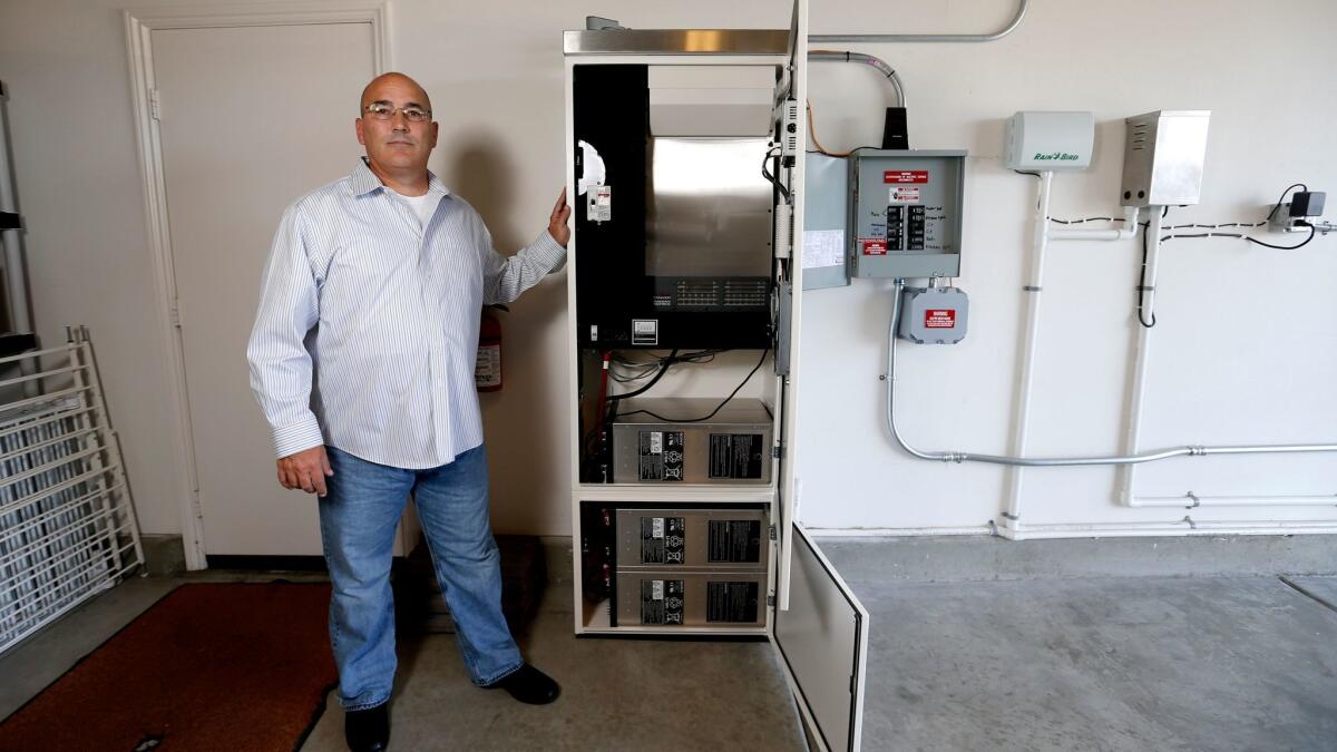 Joe Fleischmann uses the Sonnen 12-kilowatt solar battery in his garage to help power his home.