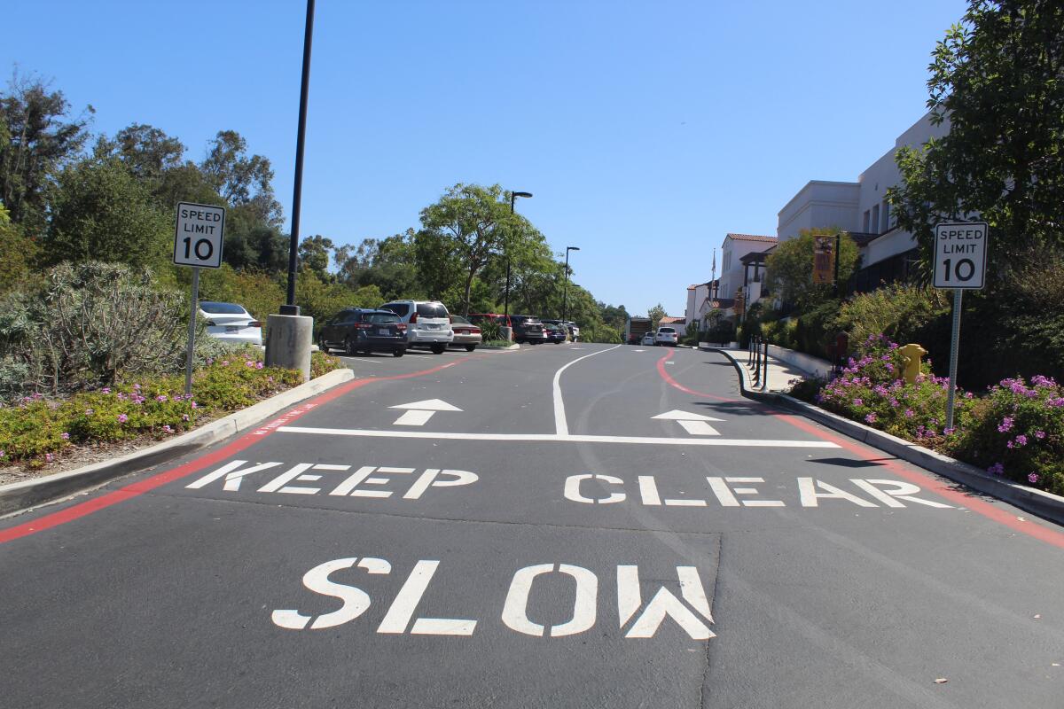 The Rancho Santa Fe School District added speed limit signs and "Slow" painting in the parking lot to curb speeding.