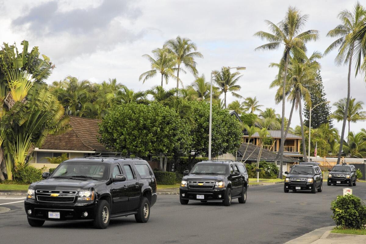 President Obama's motorcade leaves his vacation rental home in Hawaii, where the family has been for two weeks.