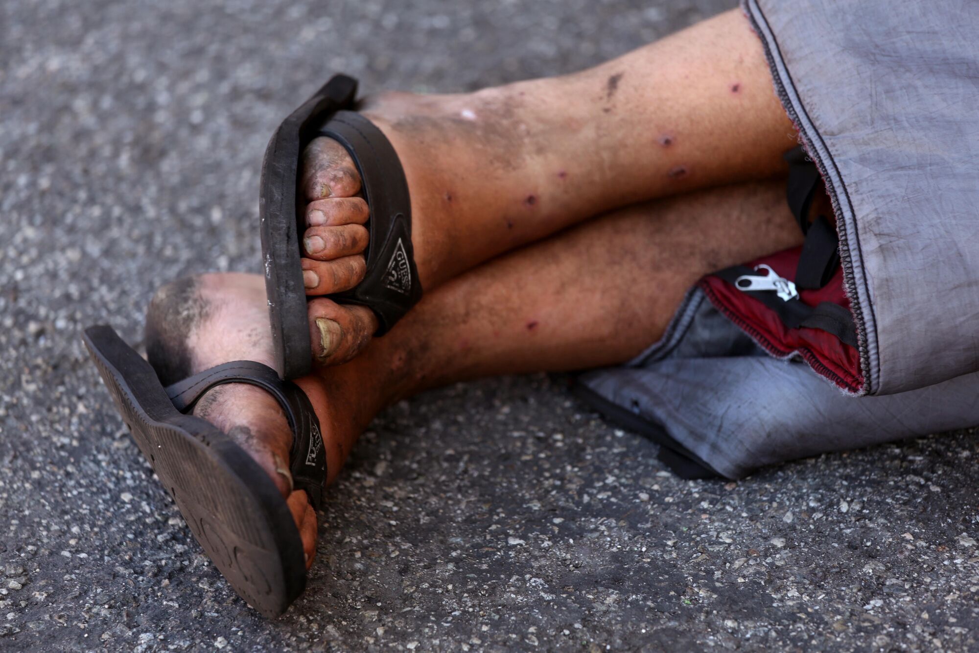 Andrew Truelove sleeps in an alley in Torrance. It's been weeks since he's showered or washed his clothes.