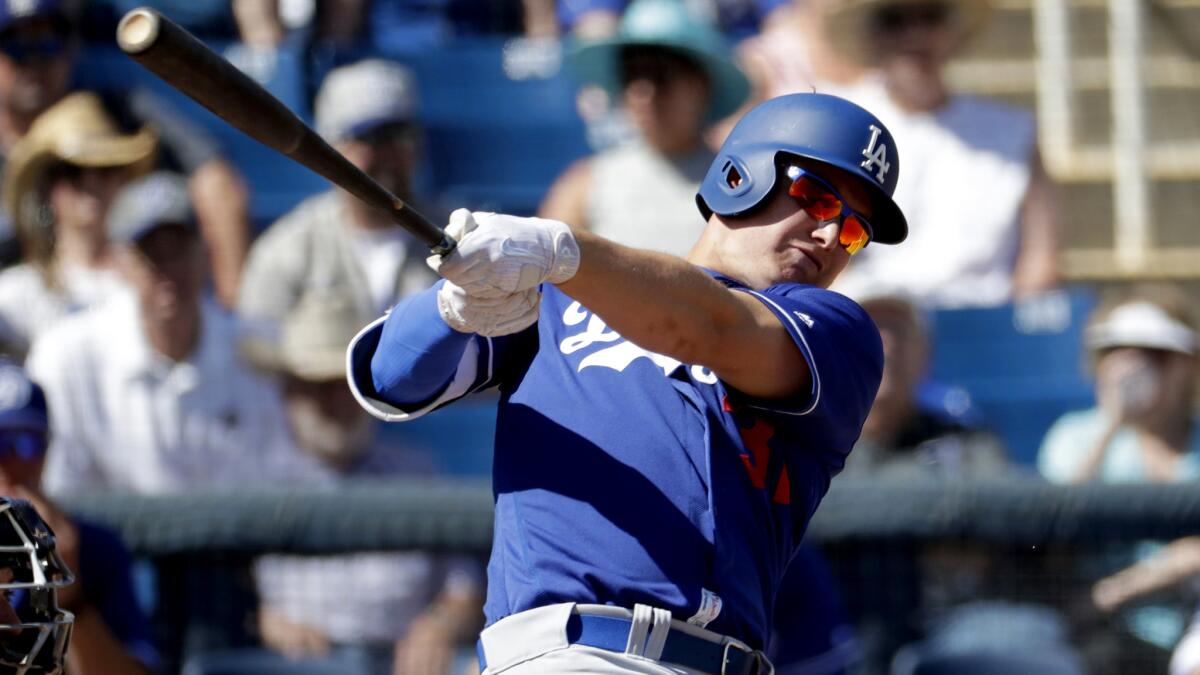 Dodgers center fielder Joc Pederson connects for a home run in the first inning against the Milwaukee Brewers on Wednesday.