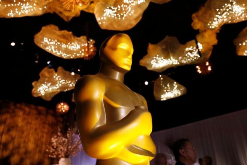 HOLLYWOOD, CA - FEBRUARY 16, 2017 - Oscar statue under the ceiling artwork that is featured through the Ray Dolby Ballroom for the 89th Oscars Governors Ball press preview of the food, beverages, and decor for this year's Governor's Ball, the Academy's official post-Oscars celebration on February 16, 2017. The Governor's Ball will follow the 89th Oscars ceremony at the Dolby Theatre on Sunday, February 26 , 2017. The Ball's 1,5000 invited guests include the Oscar nominees, show presenters and telecast participants. (Al Seib / Los Angeles Times)